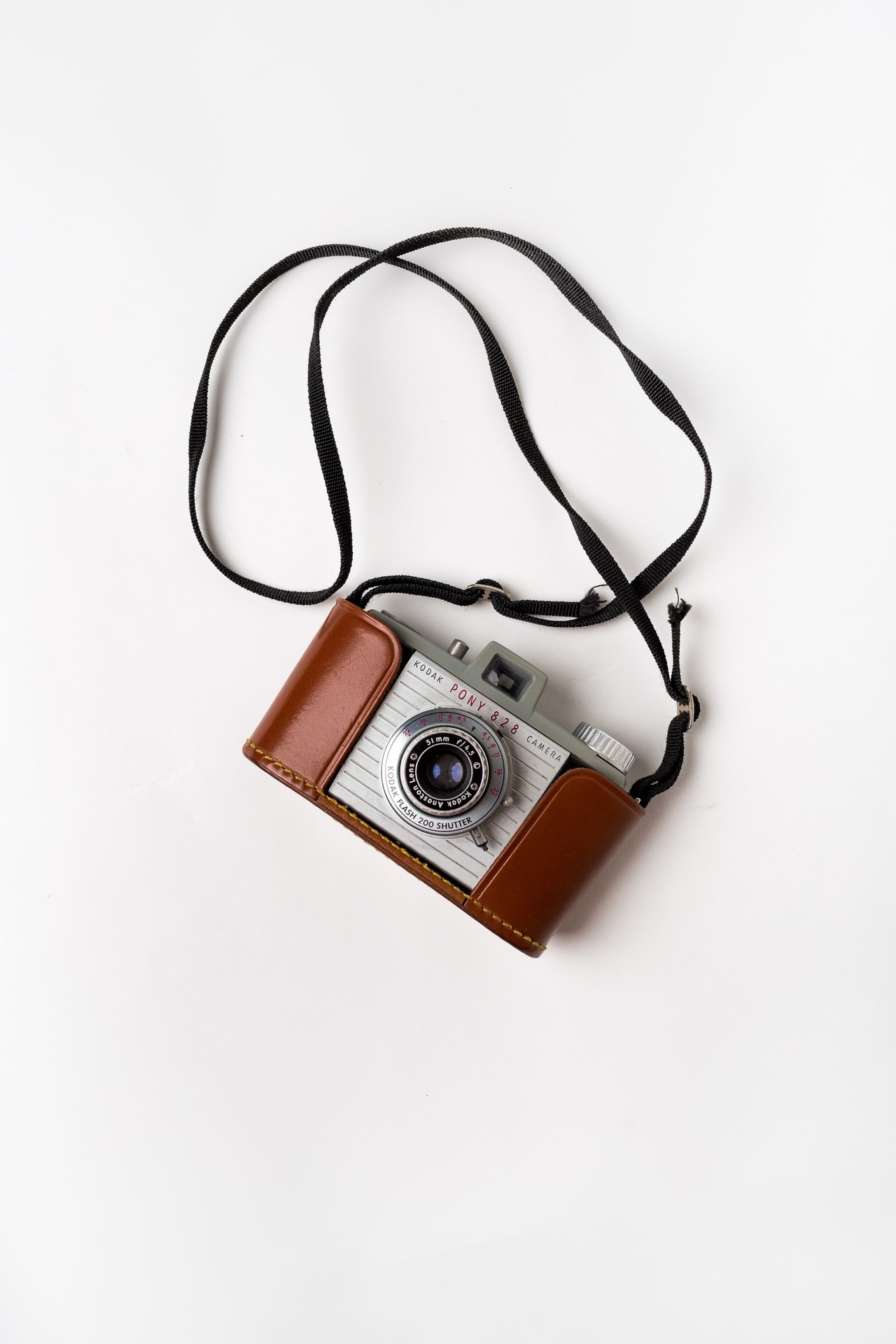 Vintage kodak photo camera with leather sheath and strap